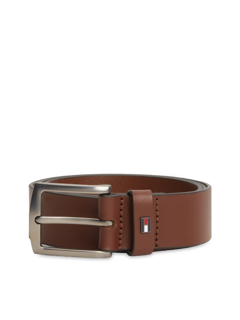 Brown leather belt with silver buckle and Tommy Hilfiger logo on a white background