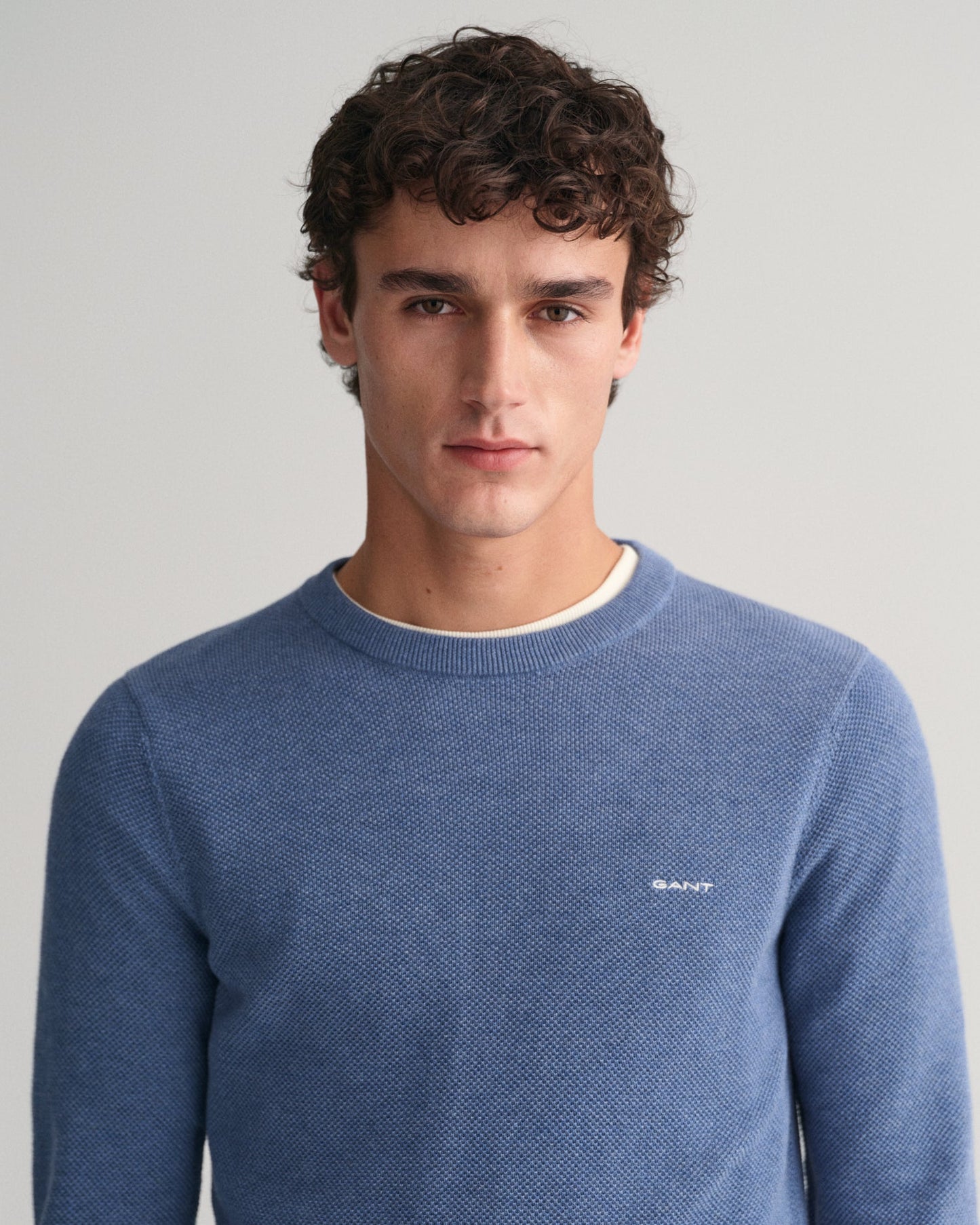 GANT Cotton Pique Crew Neck Jumper on model, front close up, denim blue - Matt O'Brien Fashions