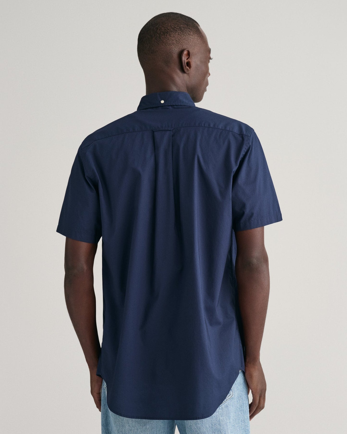 GANT Regular Poplin Short Sleeve Shirt on model, back, marine - Matt O'Brien Fashions