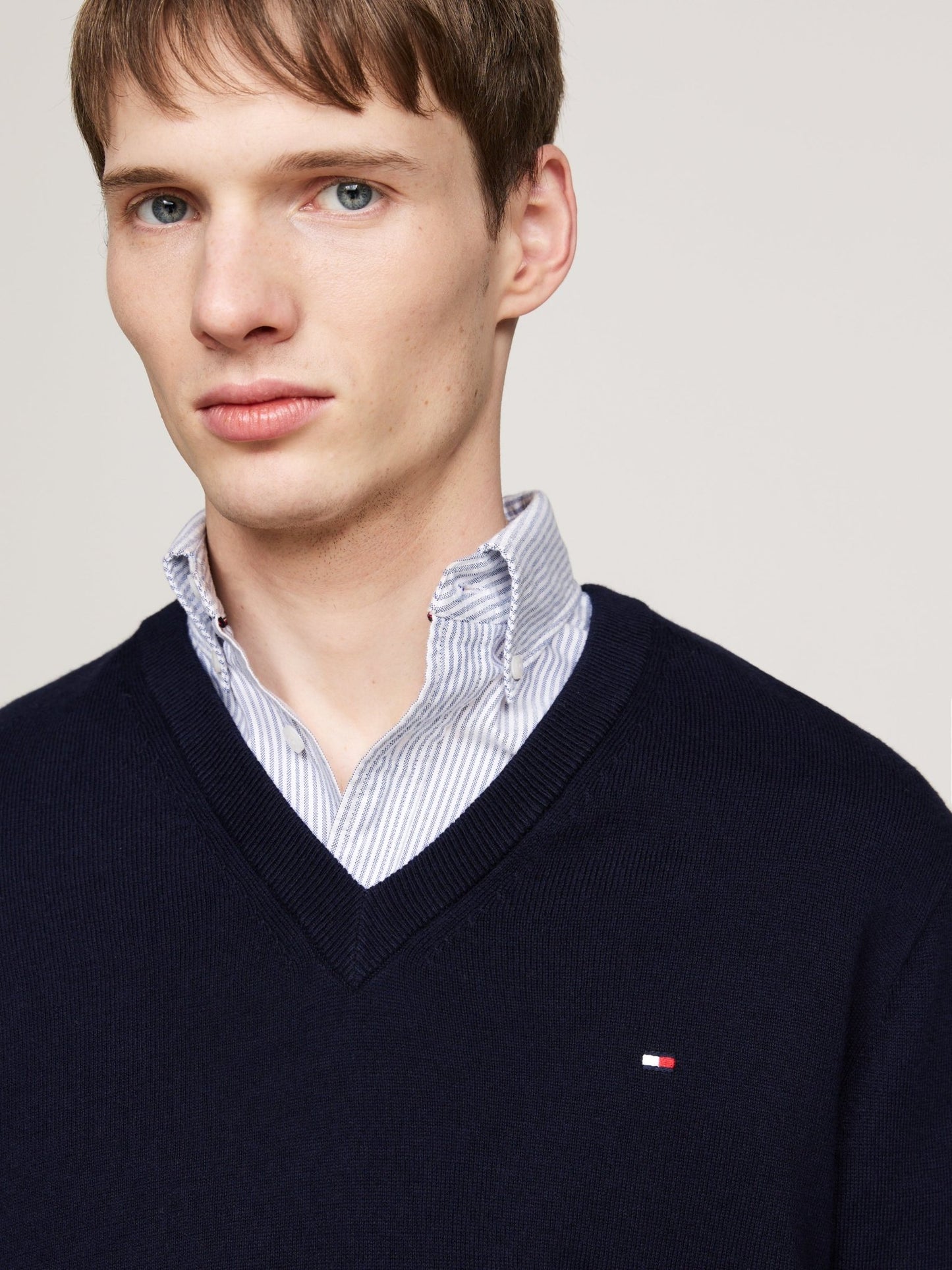 Tommy Hilfiger Cotton Cashmere V Neck Jumper on model, front close up, desert sky - Matt O'Brien Fashions