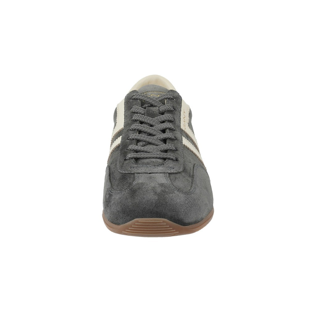 Dark gray suede runner shoe on a white background