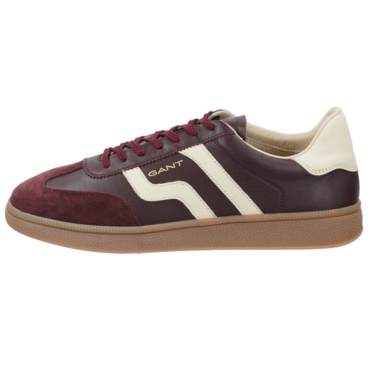 A GANT low-top sneaker in dark burgundy and cream leather with a tan gum sole, shown from a side profile on a white background.