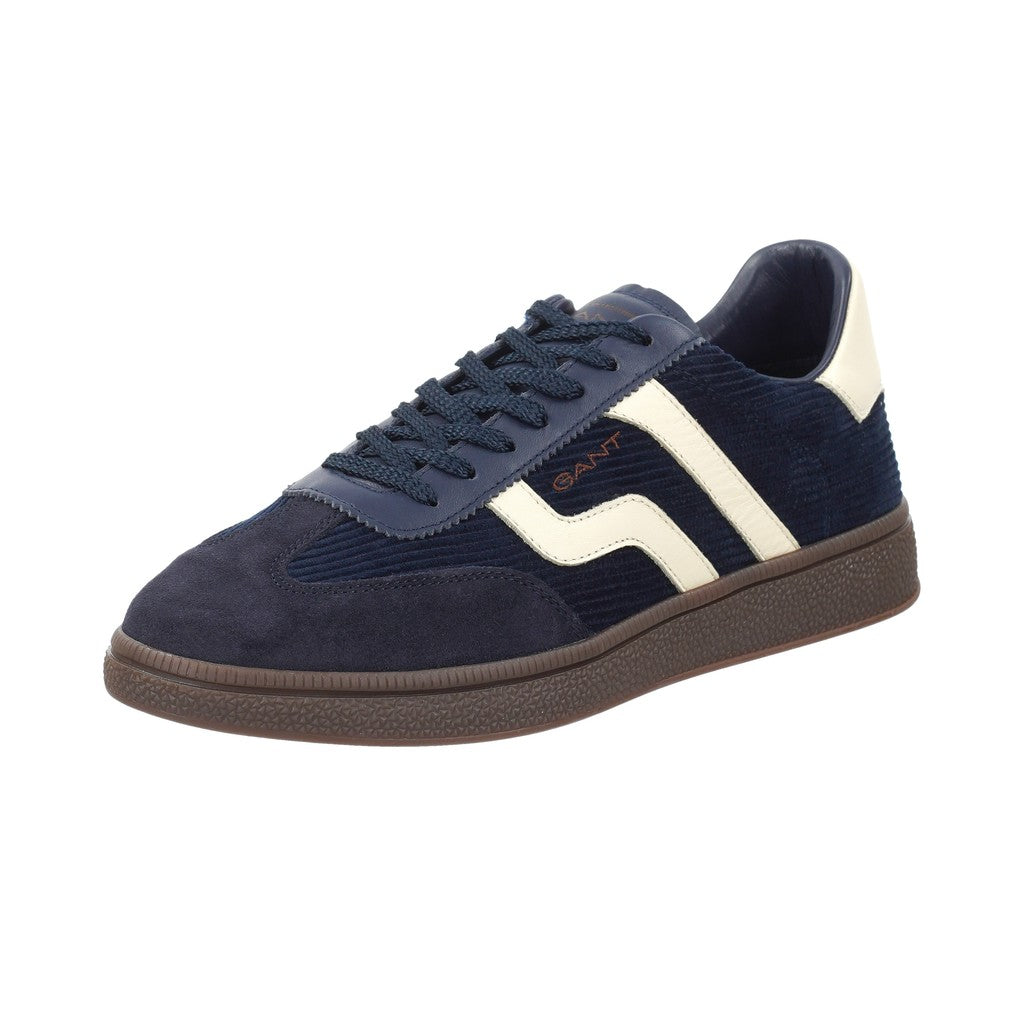 A navy blue suede and corduroy sneaker by GANT, featuring off-white side stripes, navy laces, and a brown gum sole, shown against a plain white background.