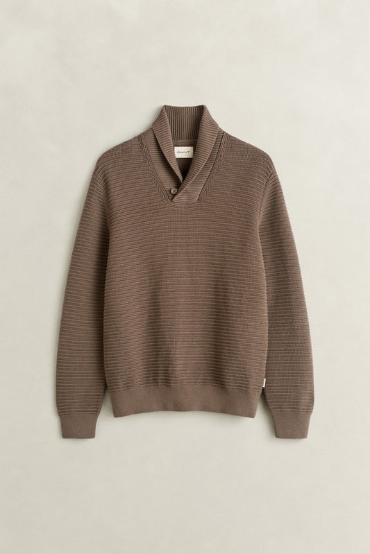 A ribbed knit sweater in a warm taupe-brown color, featuring a shawl collar and long sleeves, displayed flat against a light beige background.