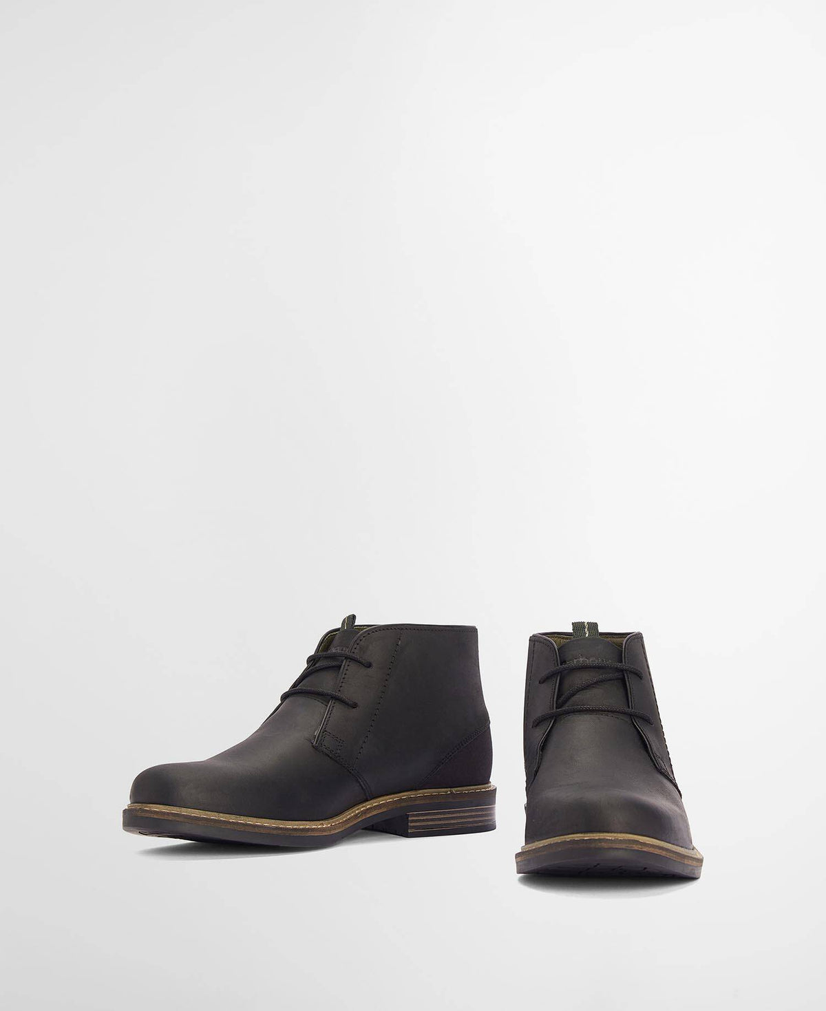 A pair of black leather lace-up ankle boots, shown from the side and front angles on a clean, light gray studio background.