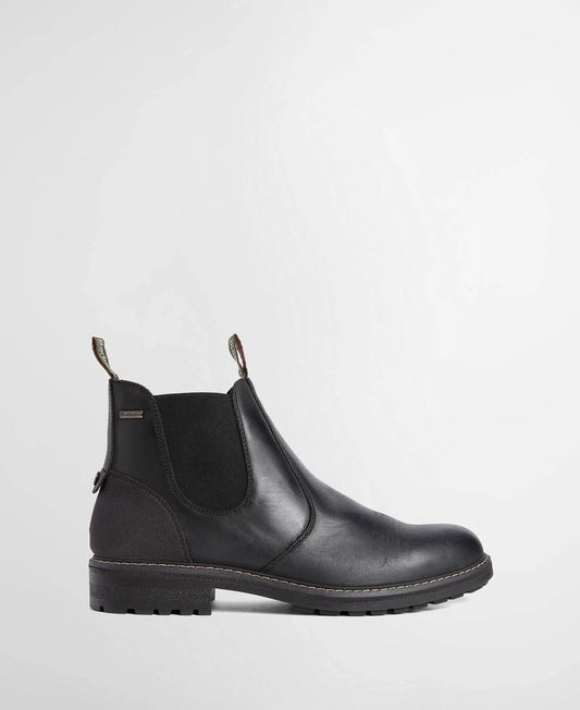 A black leather Chelsea-style ankle boot with elastic side gore, a black sole, and bright green pull loops at the top, shown in a side profile on a light gray background.