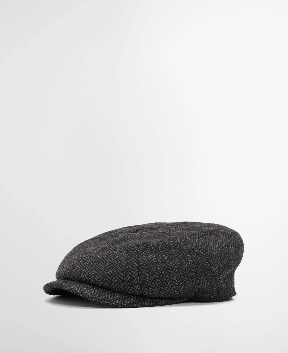 Dark gray flat cap on a light gray background