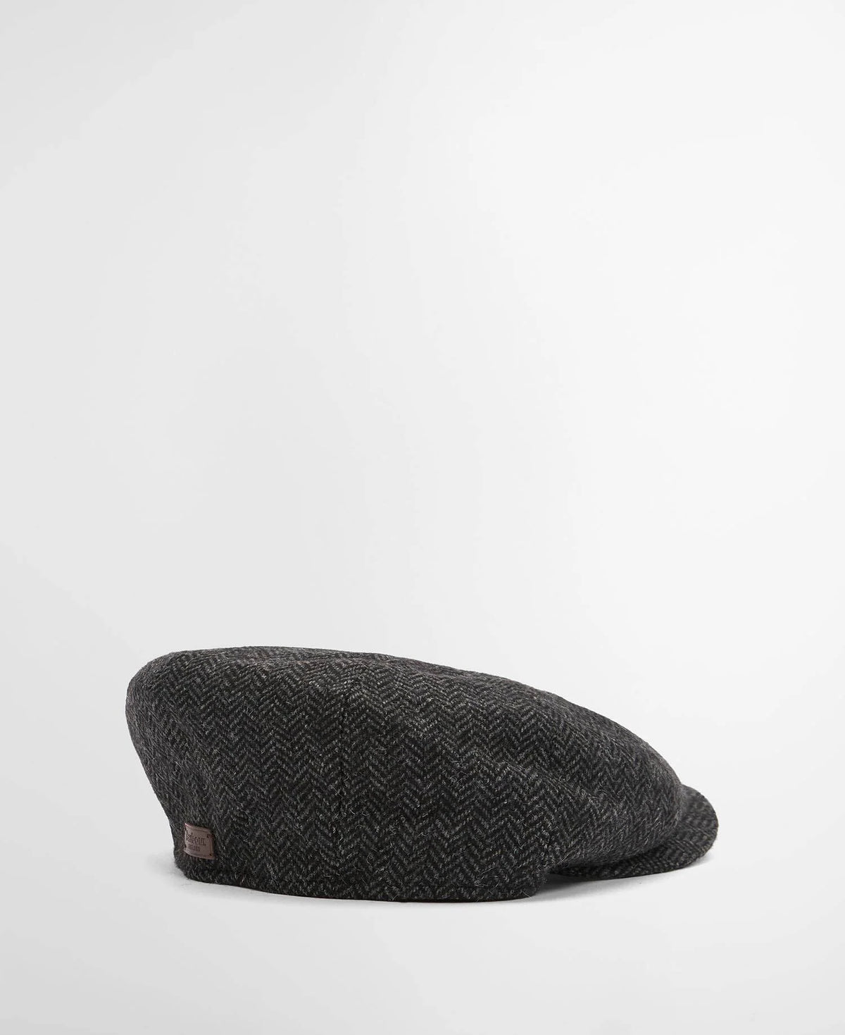 Dark gray flat cap on a light gray background