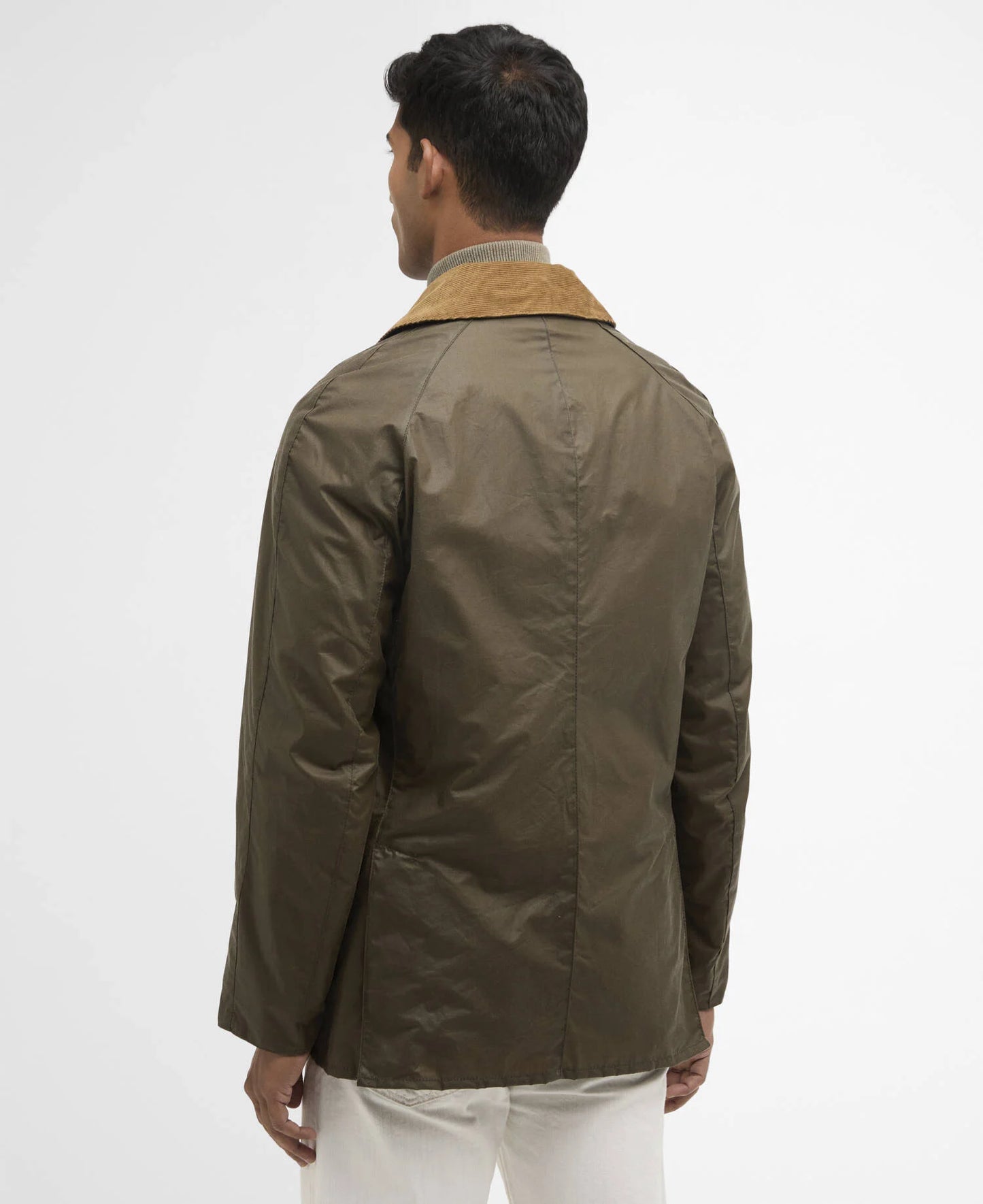 Man wearing a green jacket with a white background