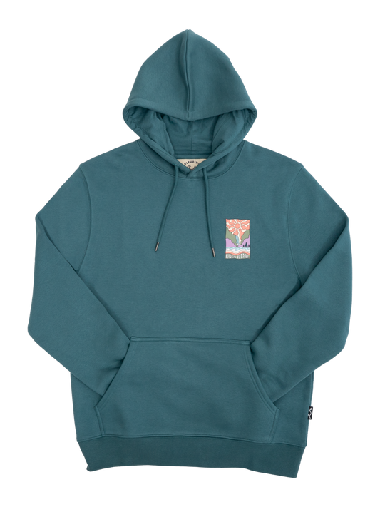 A teal green pullover hoodie with a small colorful graphic patch on the left chest, displayed against a solid white background.
