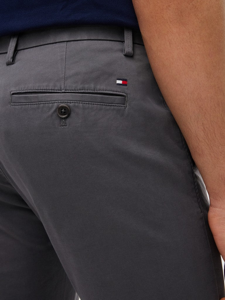 Gray pants with a Tommy Hilfiger logo on the pocket.