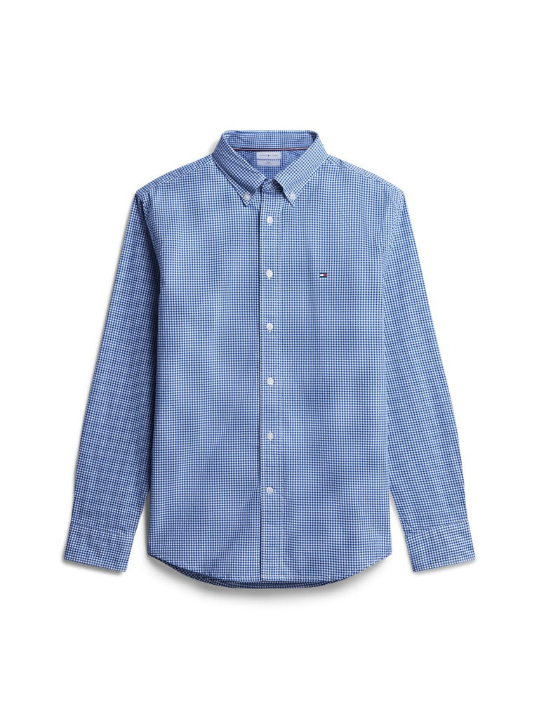 A light blue and white micro-check patterned long-sleeve button-down shirt with a small Tommy Hilfiger flag logo on the left chest, displayed on a clean white background.