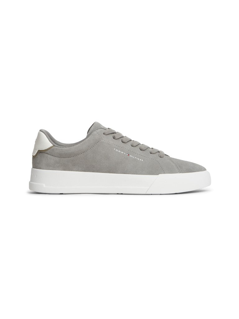 Grey suede Tommy Hilfiger sneakers with white heel tab and white sole unit 