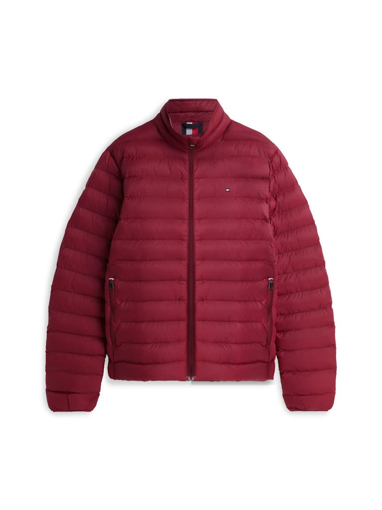 A dark red puffer jacket with horizontal quilting, a full-zip front, and a small Tommy Hilfiger flag logo on the left chest, displayed on a clean white background.