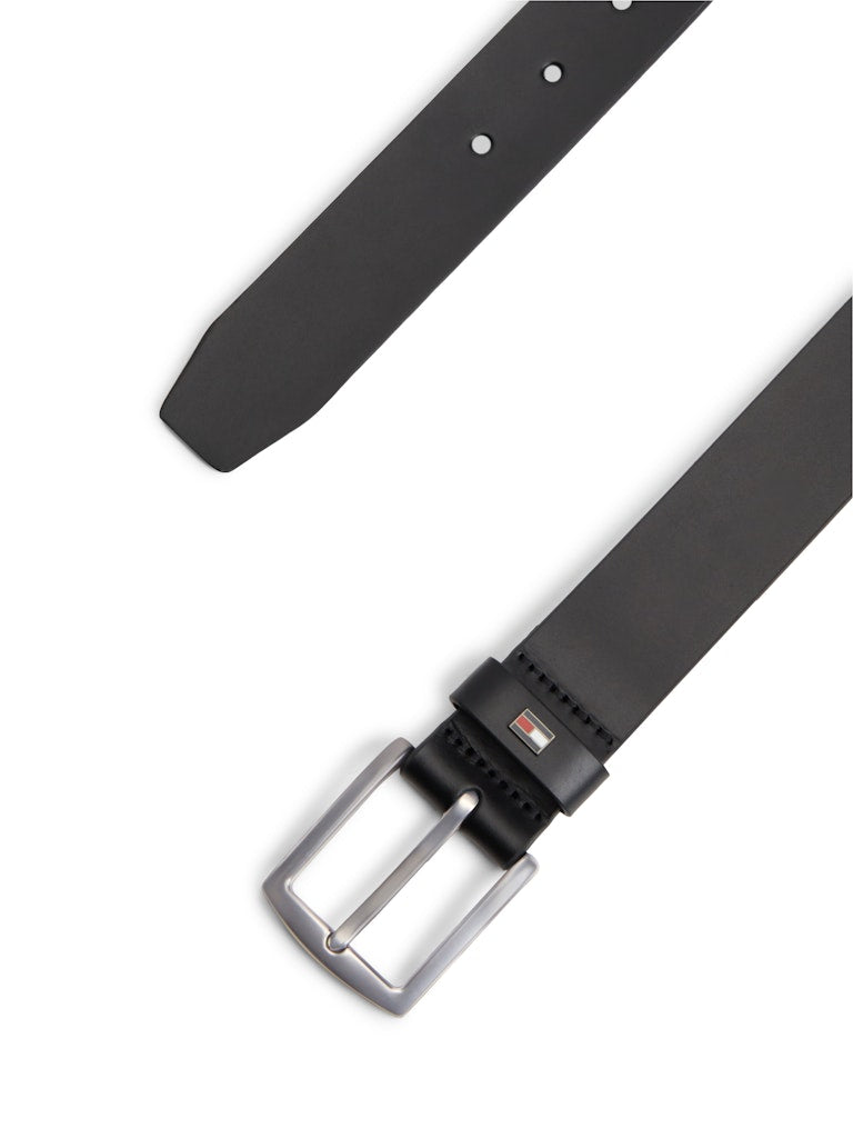 Black leather belt with silver buckle on a white background
