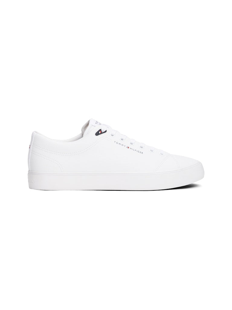 White sneaker with Tommy Hilfiger logo on a white background