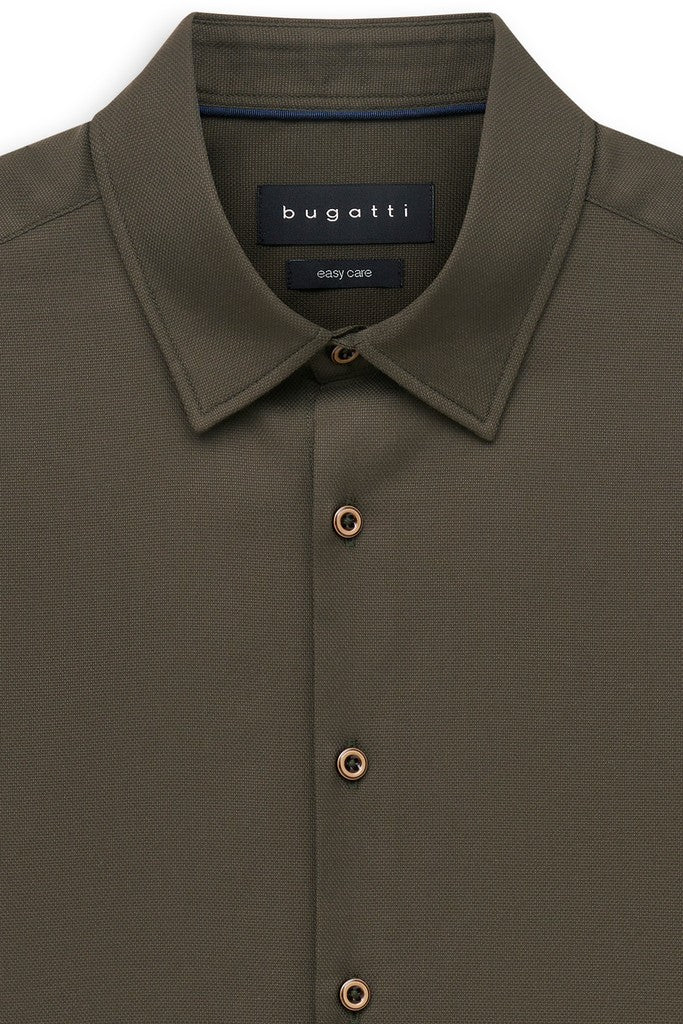 Close-up of a Bugatti Easy Care shirt in olive green, showing the collar, button-down front, and the brand label inside the neck.