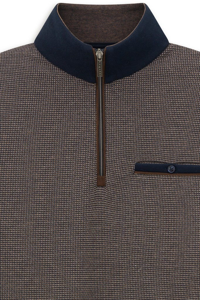 Close-up of a men's quarter-zip pullover sweater with a fine micro-check pattern in brown and beige, featuring a contrasting dark navy collar and a matching pocket.