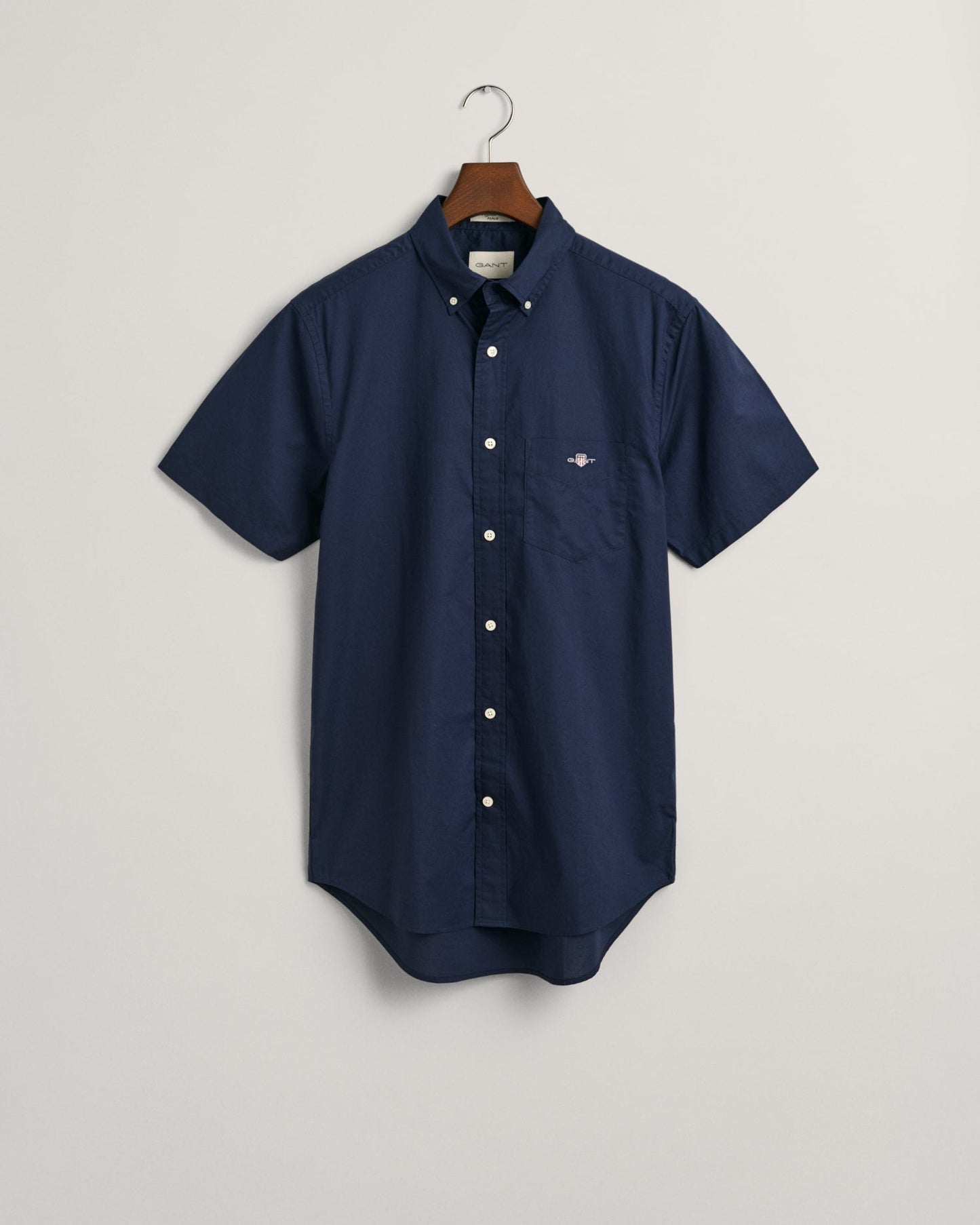 GANT Regular Poplin Short Sleeve Shirt on hanger, front, marine - Matt O'Brien Fashions