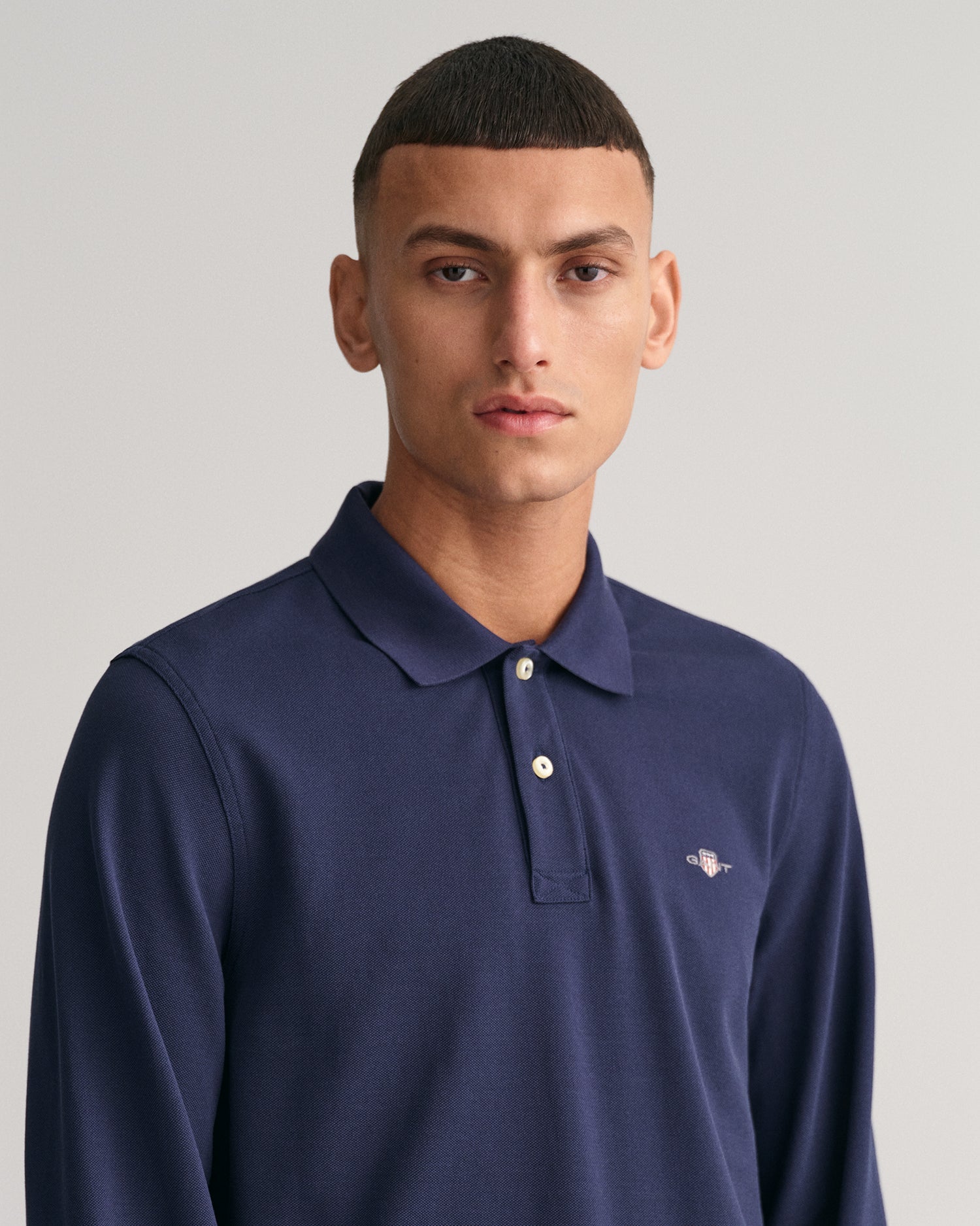 GANT Regular Shield Long Sleeve Pique Rugger on model, front close up, evening blue - Matt O'Brien Fashions