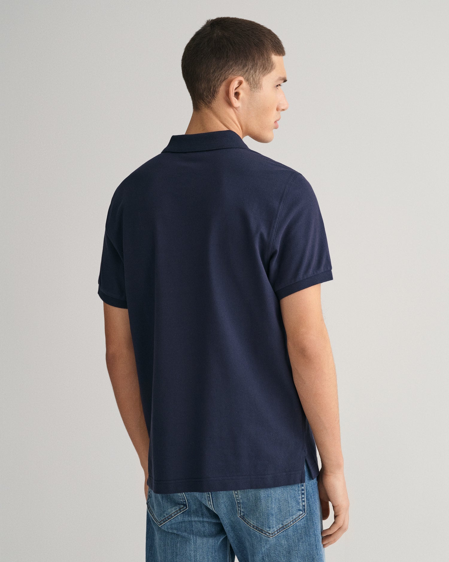 GANT Regular Shield Pique Polo on model, back, evening blue - Matt O'Brien Fashions