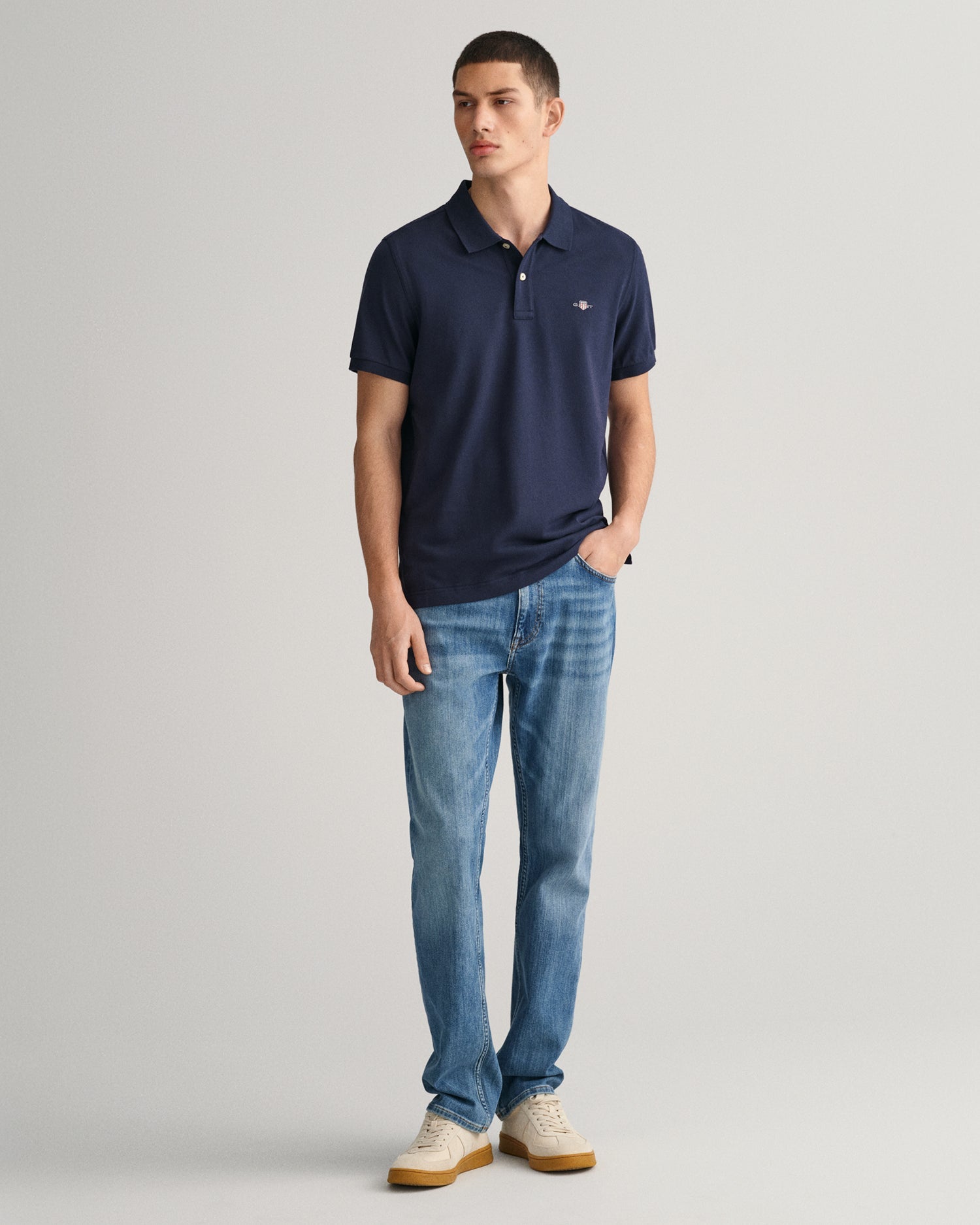 GANT Regular Shield Pique Polo on model, front full length, evening blue - Matt O'Brien Fashions