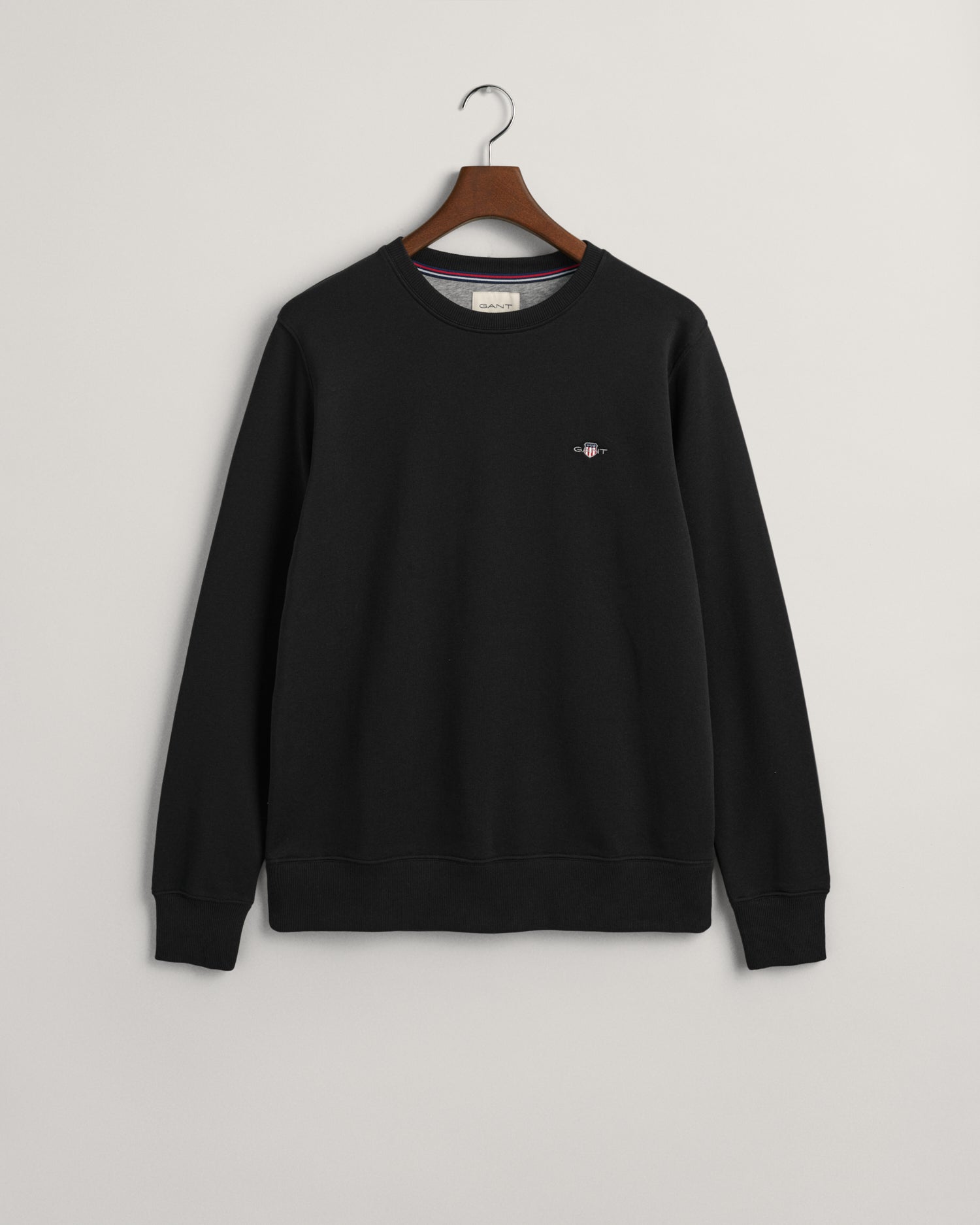GANT Shield Crew Neck Sweatshirt on hanger, front, Black - Matt O'Brien Fashions
