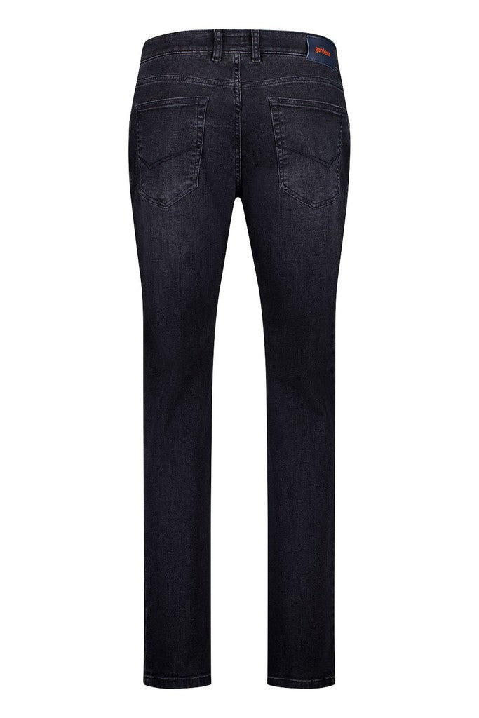 Rear view of dark charcoal gray slim-fit jeans on a white background.